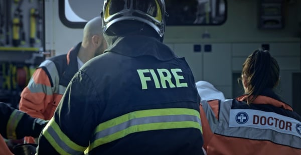 firefighter working with other public safety professionals