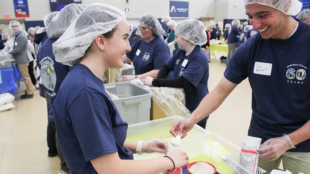 Neumann students pack 30,000 meals for Kids Against Hunger